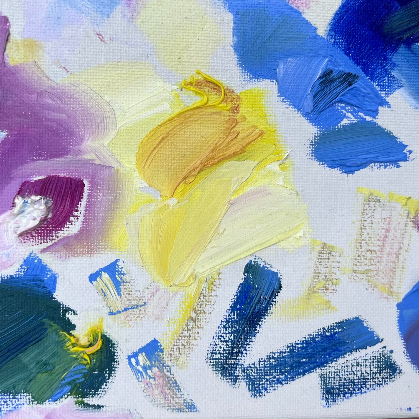 Detail of small square non-objective oil painting with significant paint globs showing its original purpose as a palette. Deep pinks, reds and blue contrast white canvas showing through. Blending, visible brush strokes and thick paint create texture and visual interest.