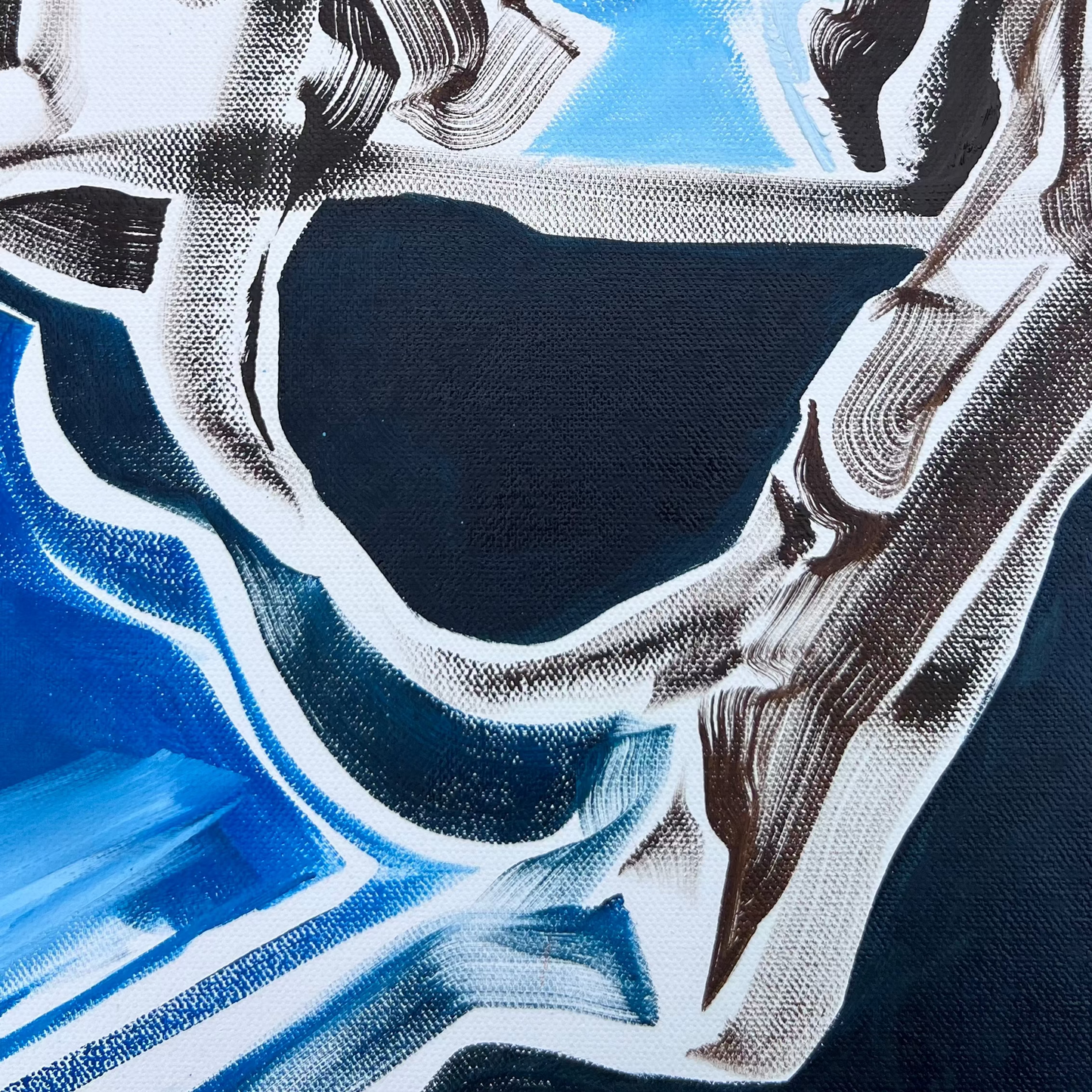 Deep blue creates depth in this non-objective abstract painting with bold contrast and gestural smokey lines moving and flowing throughout its composition. This detail highlights the texture and line of the brush showing.