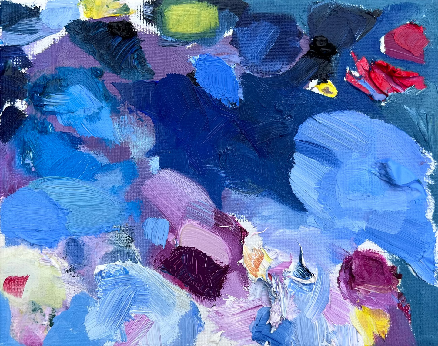 Small non-objective oil painting featuring bold, bright colors and thick textural brush strokes. Red, blues and purples dominate the composition, with swaths of color in all directions. 