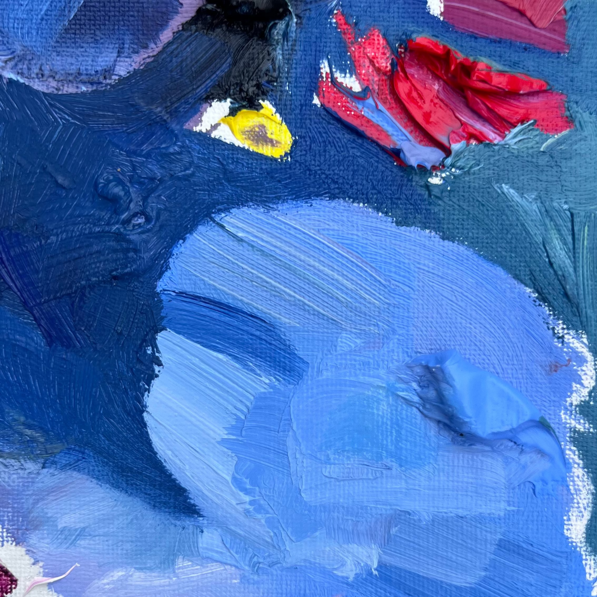 Detail of small non-objective abstract painting featuring kings blue and bright red