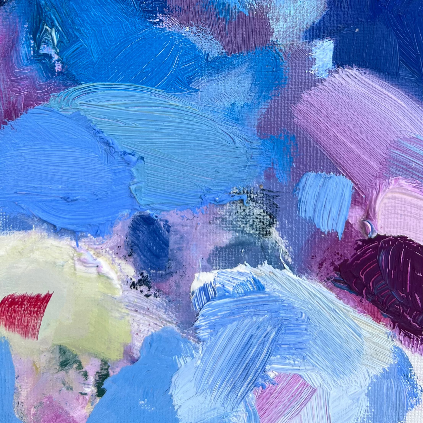 Detail of small non-objective oil painting featuring bright blue and purple brush strokes with lots of texture and layered detail.